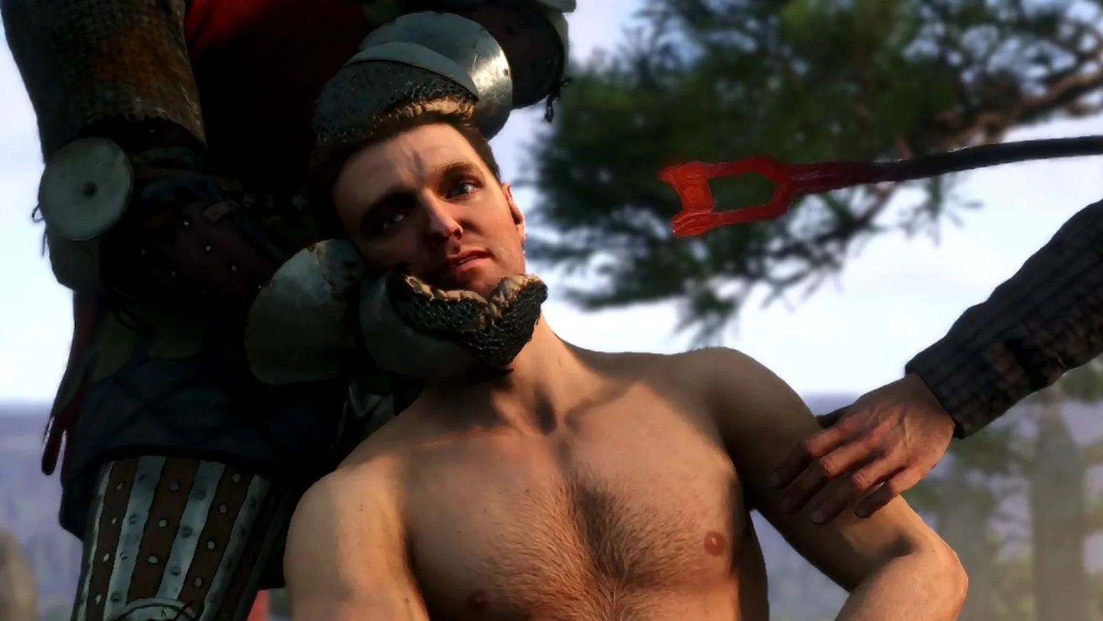 Henry from Kingdom Come: Deliverance, shirtless and held still by armored men, with a red-hot brand coming toward him